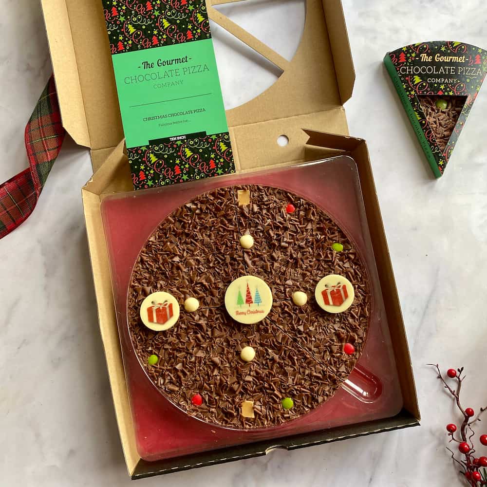 10" Christmas Pizza shown alongside one of our Christmas Slices.
